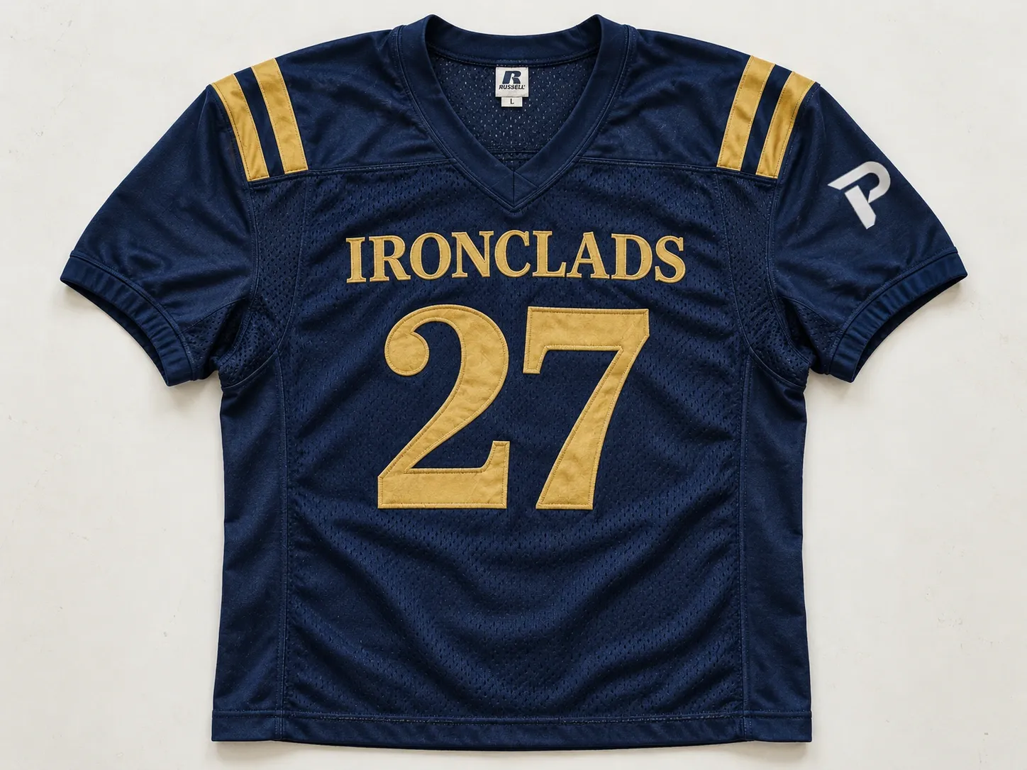 A navy Ironclads home jersey with gold number 27.